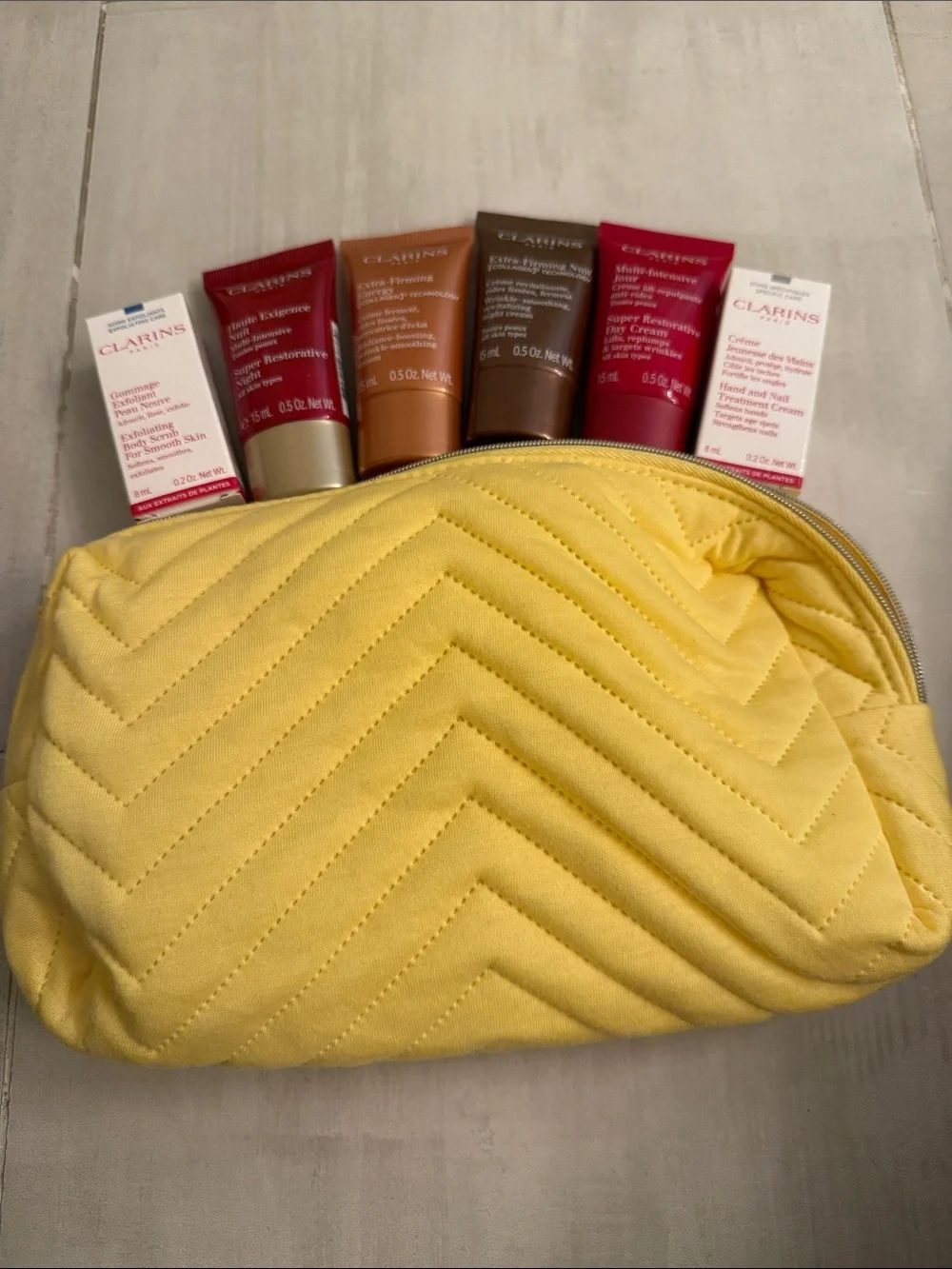 Clarins Quilted Chevron Cosmetic Pouch in Bright Yellow